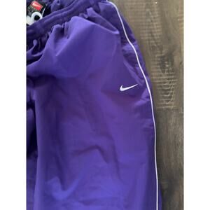 Vintage 1990s Nike track pants side swoosh